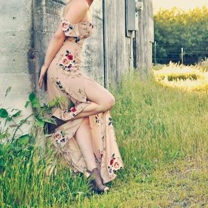 Selling this floral dress, with opening.